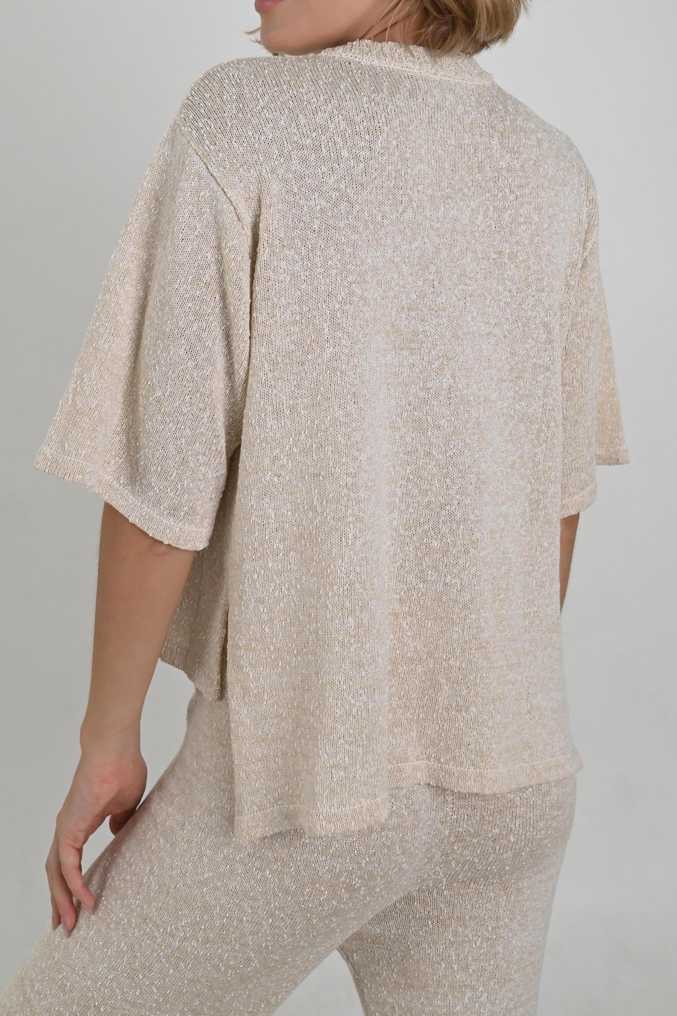 Back of Laura Cream Knit Tee made from a cotton-acrylic blend