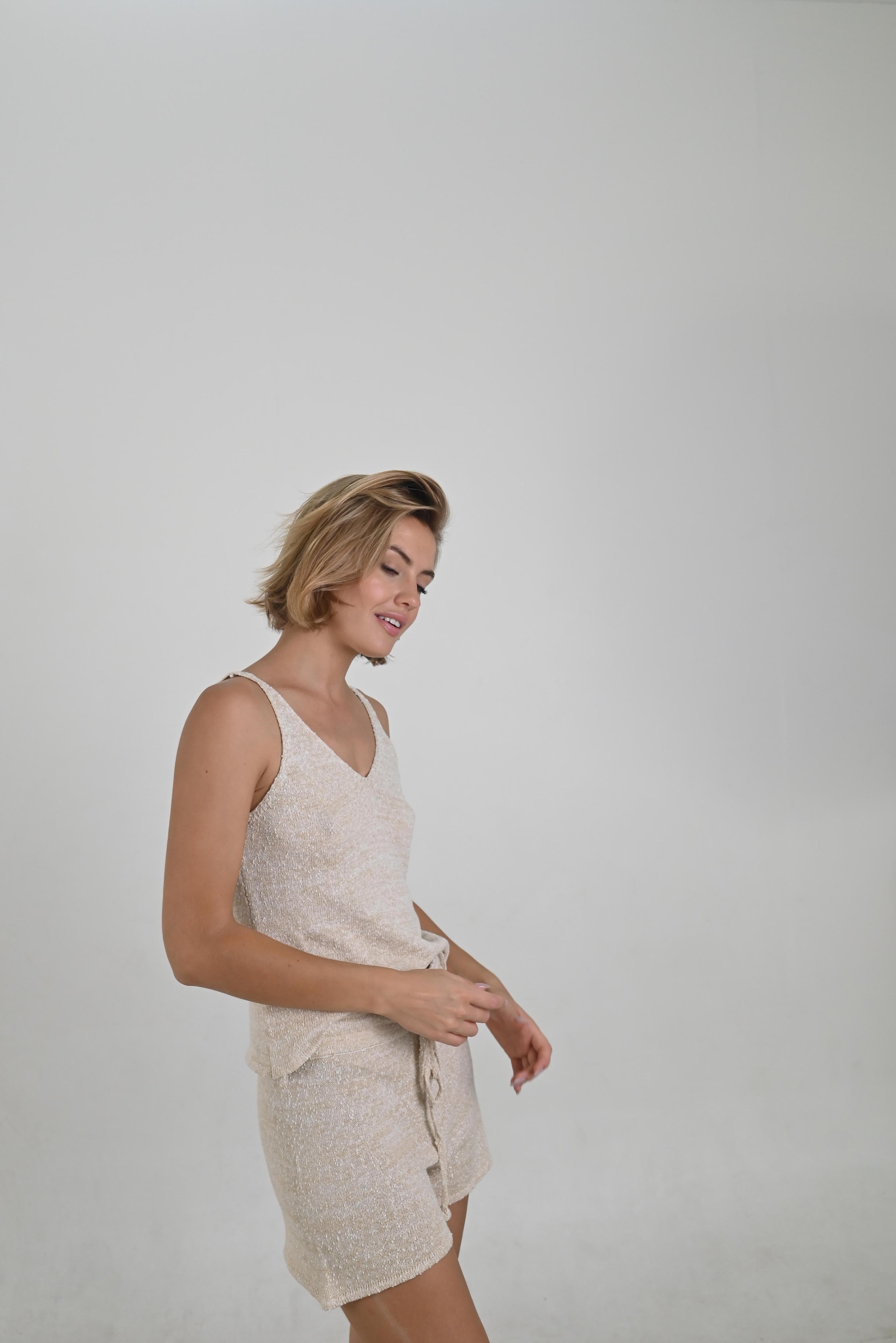 Side of Quinn Cream Knit Short made from a cotton-acrylic blend